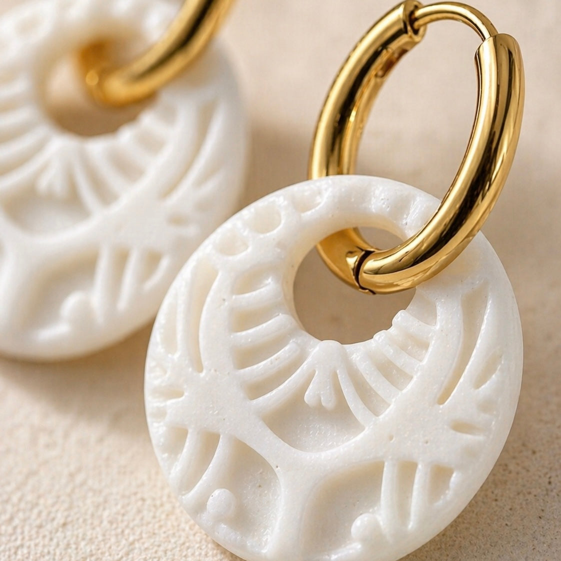 White Embossed Circle Huggie Earrings